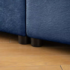 Canapé modulable avec rangement, dossier cylindrique et accoudoirs, assise profonde et confortable, durable et offrant un bon soutien pour le salon.