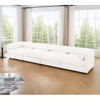 Canapé modulable avec rangement, dossier cylindrique et accoudoirs, assise profonde et confortable, durable et offrant un bon soutien pour le salon.