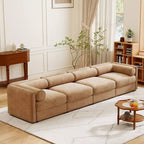 Canapé modulable avec rangement, dossier cylindrique et accoudoirs, assise profonde et confortable, durable et offrant un bon soutien pour le salon.