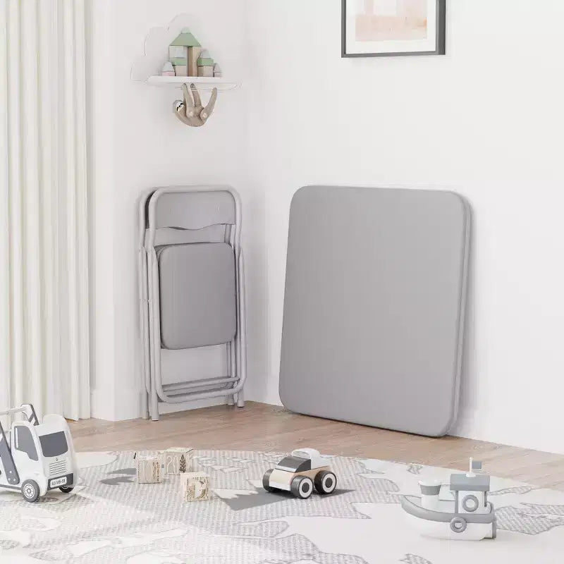 Ensemble 3 pièces table et chaises pliantes avec revêtement en PU – Idéal pour manger, lire et jouer