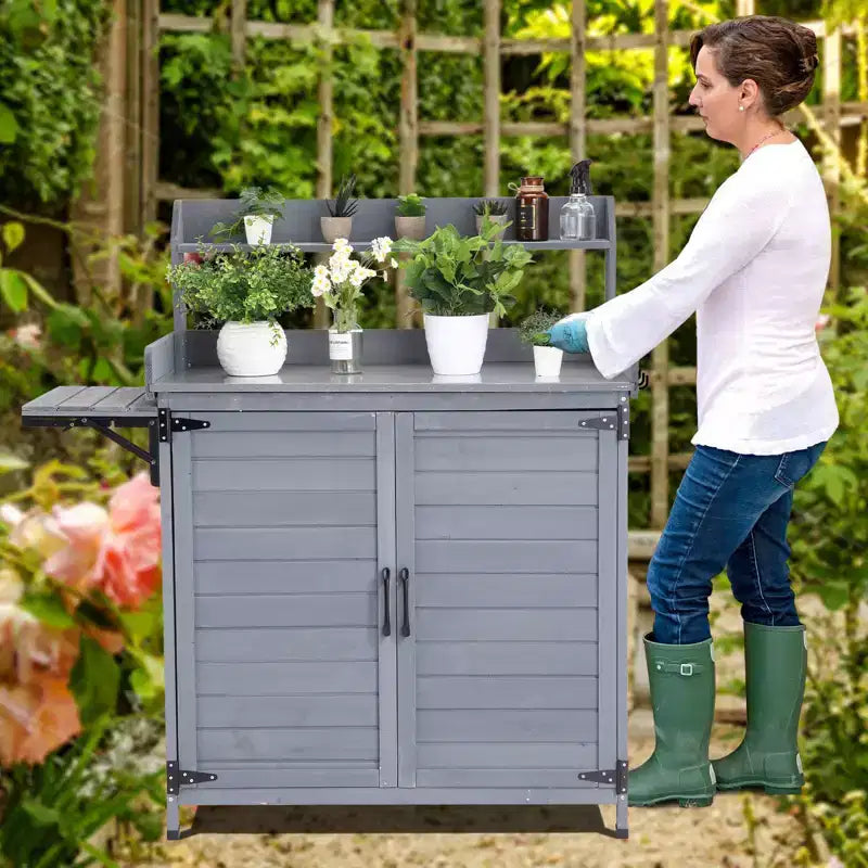 Établi de rempotage extérieur avec étagère pliable, armoire de rangement et plan de travail durable en métal galvanisé pour jardin, terrasse ou arrière-cour