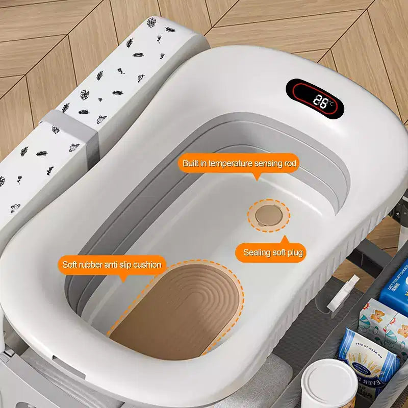 Table à langer et baignoire pour bébé Foalom 2 en 1, design pliable et rangement pour les soins du nouveau-né.