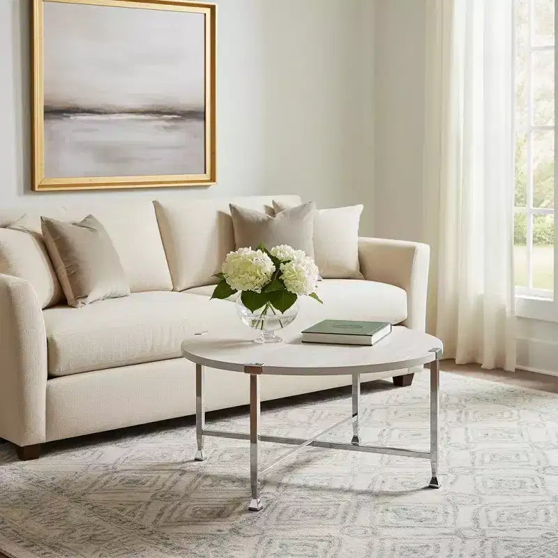 Table basse ronde HomeRoots de 36 po avec pieds croisés en métal blanc et argenté