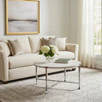 Table basse ronde HomeRoots de 36 po avec pieds croisés en métal blanc et argenté