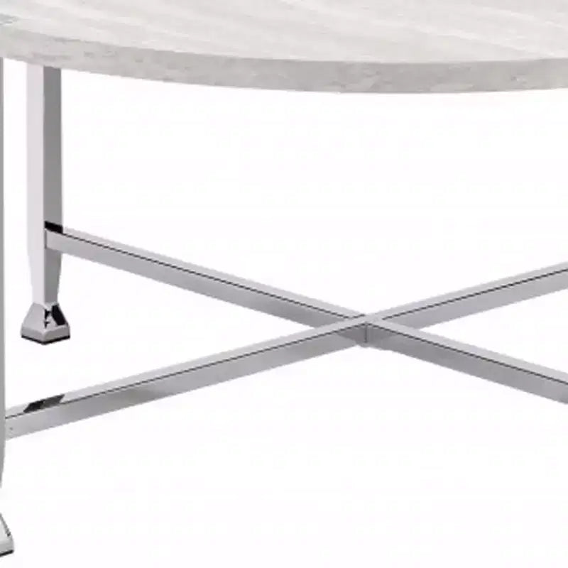 Table basse ronde HomeRoots de 36 po avec pieds croisés en métal blanc et argenté