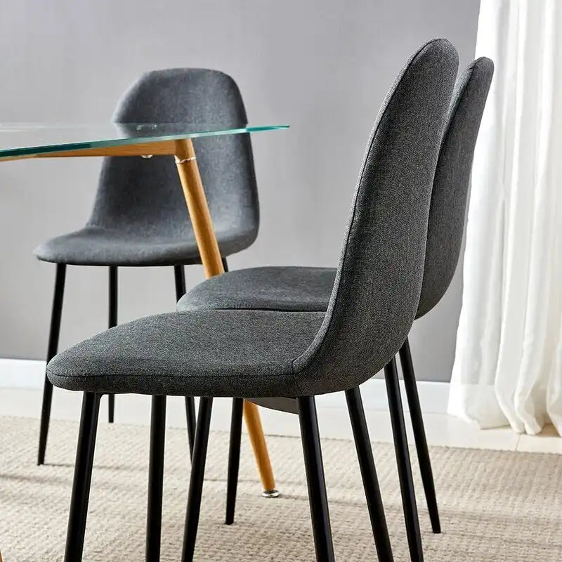Table de salle à manger/cuisine moderne avec plateau en verre et chaises en tissu